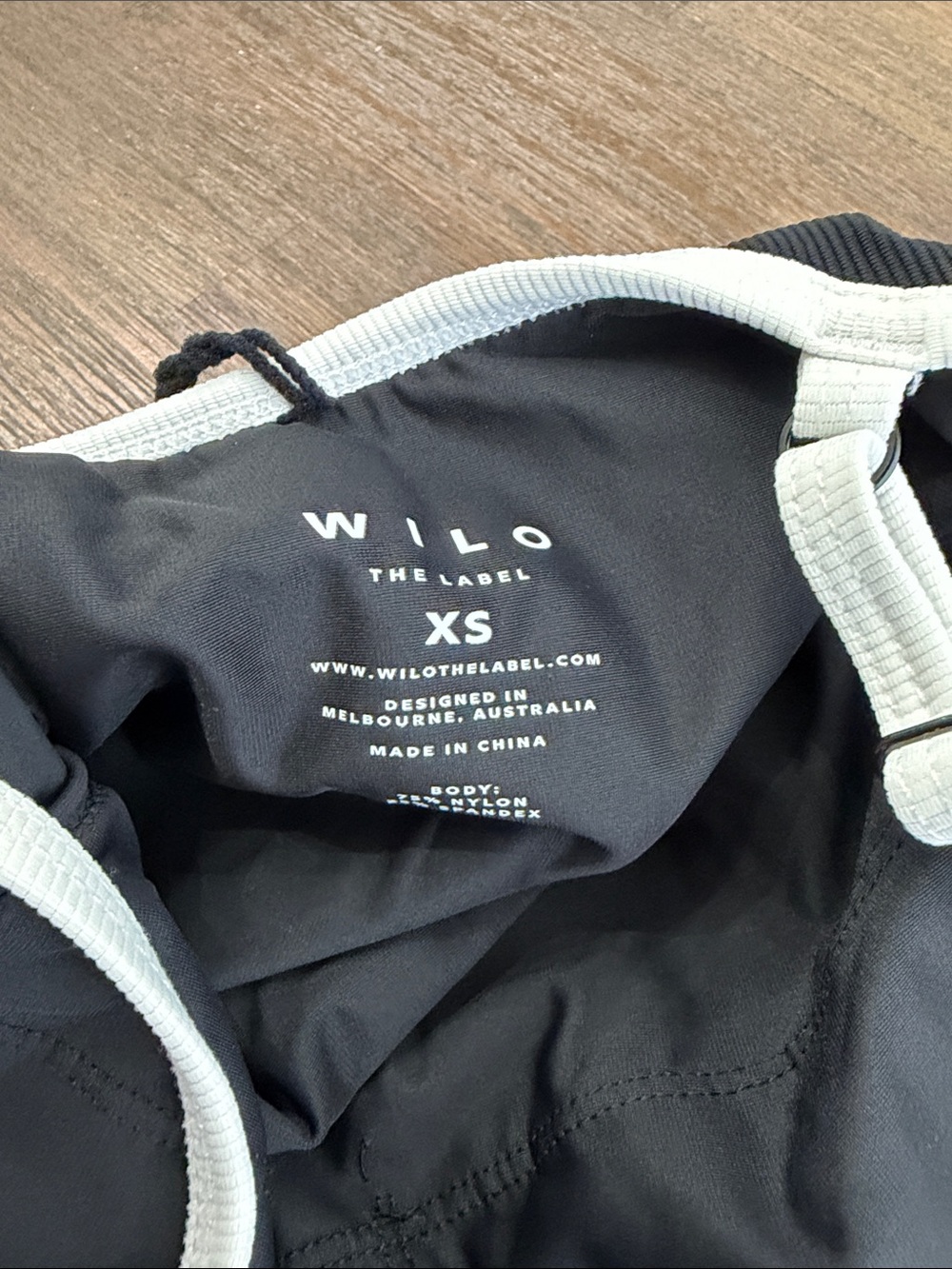 Classic Black One-Piece Swimsuit with White Trim - Picture 2 of 3